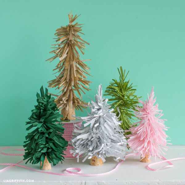 DIY Crepe Paper Bottle Brush Trees Craft Idea For Christmas Decor Using Popsicle Sticks, & Cork - Inventive ideas for crepe paper decorations