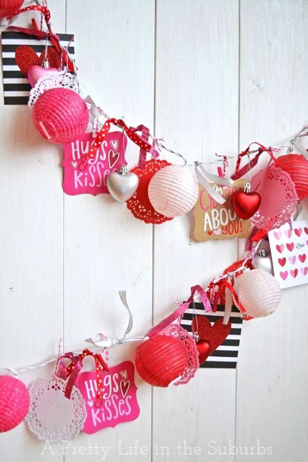 Easy To Make Valentine's Love Garland Craft With a String of Lights, Cards, Doilies, and Some Pretty Ribbon - Crafting a Decorative Garland for Valentine's Day
