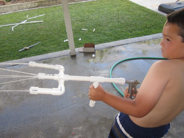 Make A Fun Garden Hose Water Gun Activity With PVC Pipes - PVC Pipeline Projects for Kids 