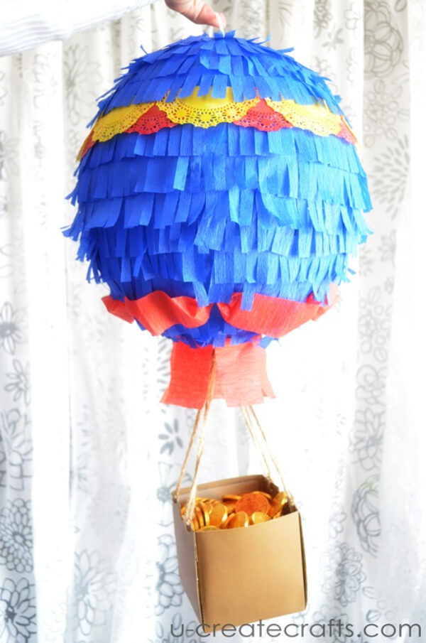 Pinata Inspired Hot Air Balloon Craft Tutorial For Kids To Make At Home - Advising on how to adorn with crepe paper