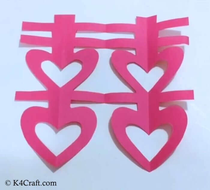 Pretty Heart Wall Decoration Made With Paper Cutting Technique - Fascinating Papercutting Schemes For Decoration
