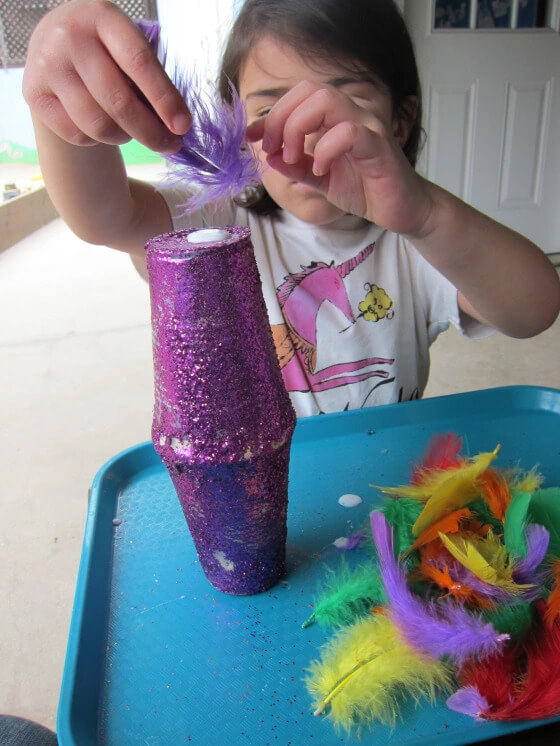 Reuse Macaras Musical Instrument Craft Made With Two Paper Cups, Feathers & Glitter - Kindergarteners Designing Maracas Art