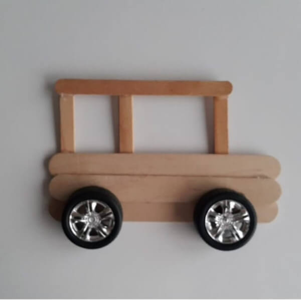 Super Easy Popsicle Sticks Bus Craft Idea For Kindergartners - Putting Together a Car with Popsicle Sticks