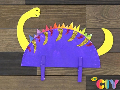 Beautiful Dinosaur Paper Plate Craft With Clothespins-Crafting a dinosaur with the help of a paper plate is a great way to entertain kids