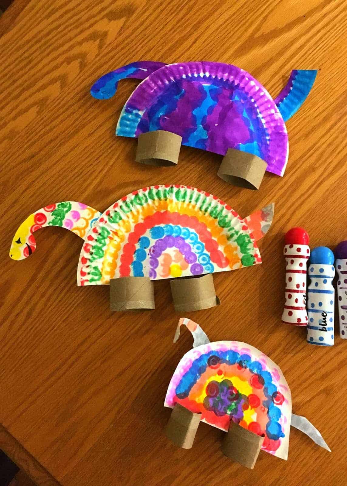 Colorful Paper Plate Dinosaur Craft Activity Made With Paper Towel Roll-A paper plate is an ideal tool for making a dinosaur with children