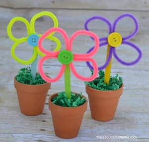 Make Colorful Pipe Cleaner Flower Craft Project Using Mini Terra-Cotta Pots, Popsicle Sticks & Buttons-Ways to Celebrate May Day with Children