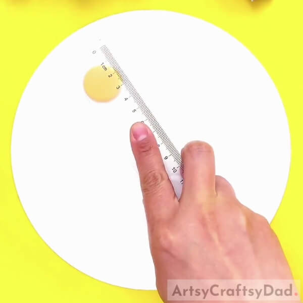 Pressing The Clay Ball - Crafting Clay Birds for Your Garden