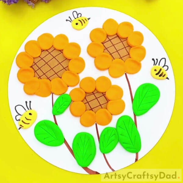 Your Sunflower Garden With Bees Clay Craft Is Ready! - Artistic concept of a sunflower garden made of clay and paper.