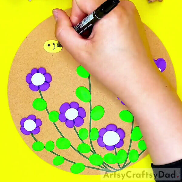 Adding The Yellow Bee-Creating a bee-filled flower garden with clay for children