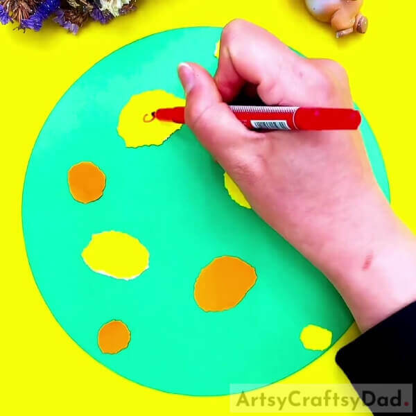 Making And Detailing All Petals-A fun and easy paper-tearing flower craft for the little ones. 