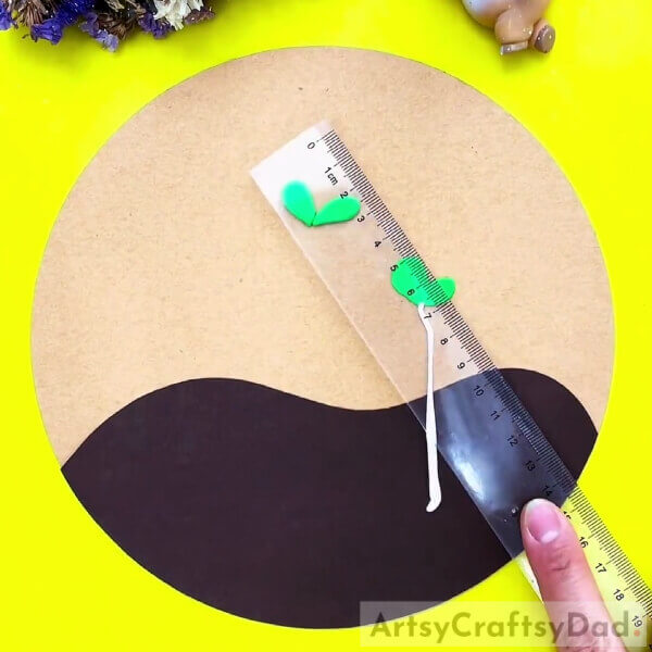 Making Stem And Another Leaf-A Tutorial to Show Kids How to Start Seeds in Clay
