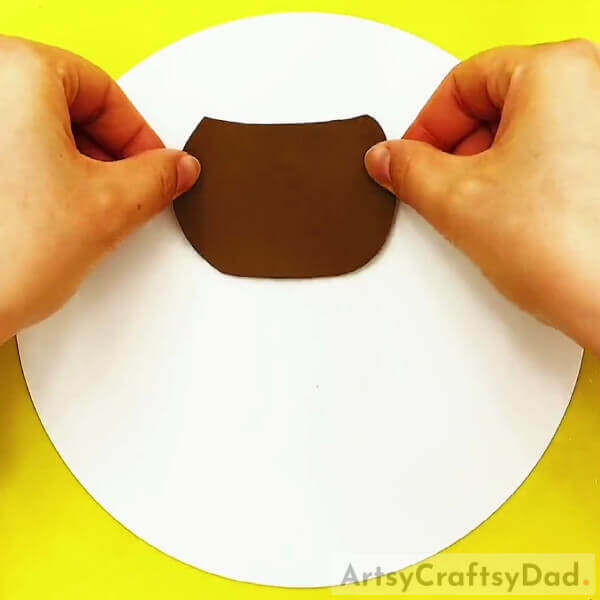 Pasting A Pot Cut Out- Crafting a Plant Pot Display for Children