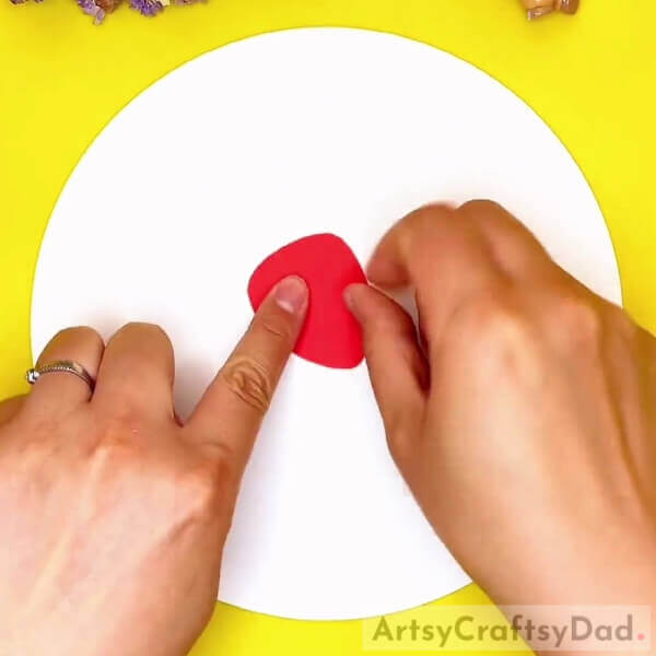 Pasting A Strawberry Cut Out- Kids can make paper and clay strawberries. 
