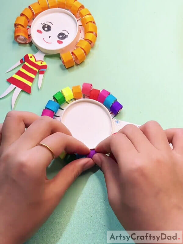 Completing Curling The Strips- Paper Cup Art Project Guide For Kids With Curly Hair 