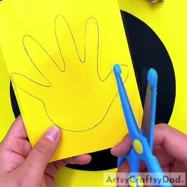Cutting Out The Layout- Guide to Construct a Duck with a Paper Palm Cutout for Kids
