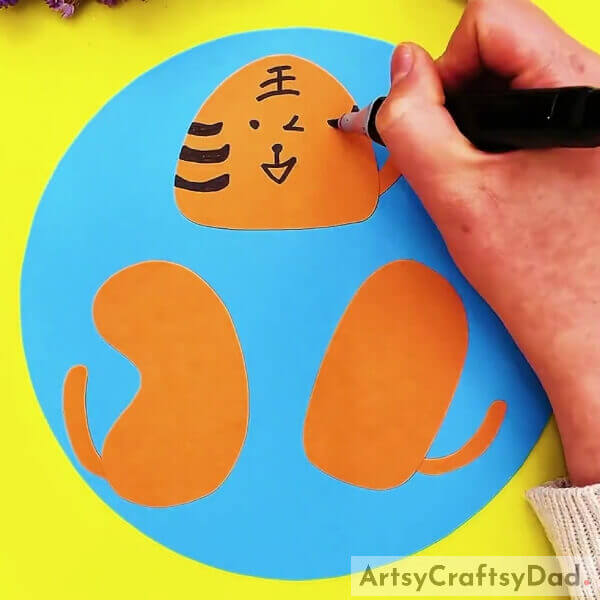 Detailing The Tiger- Instructions on Crafting a Sweet Tiger Paper Cutting with Kids in Mind