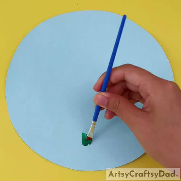 Drawing Green Color Grass On Construction Paper- Tutorial on Making Peanut Shell Chicks for Children
