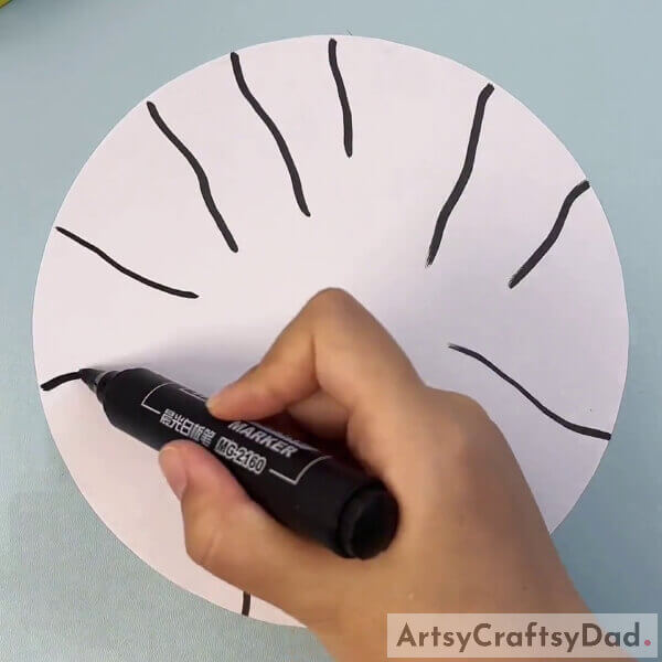 Drawing Wavy Lines Around White Sheet For Tree Branches- Creating a butterfly design on a tree with a finger stamp 