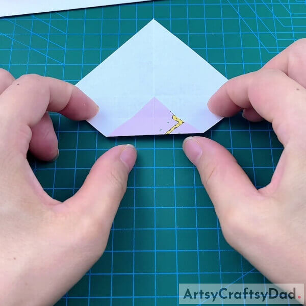 Folding Edges To The Center - Creating A Flip Flop Origami Out Of Paper For Kids