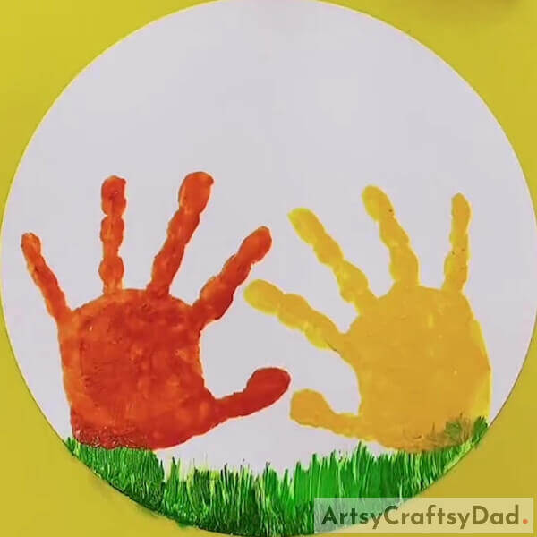 Make sure you got the imprints of both hands right - How to Paint Chickens with Handprints