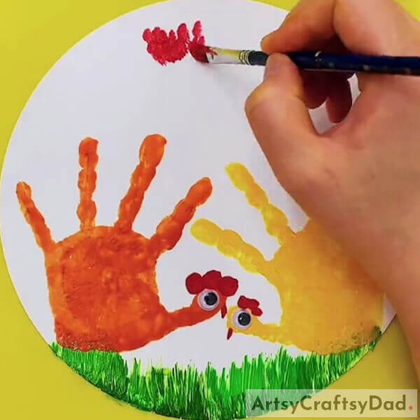Make the clouds using red paint - Tips for Handprinting Art of Chickens