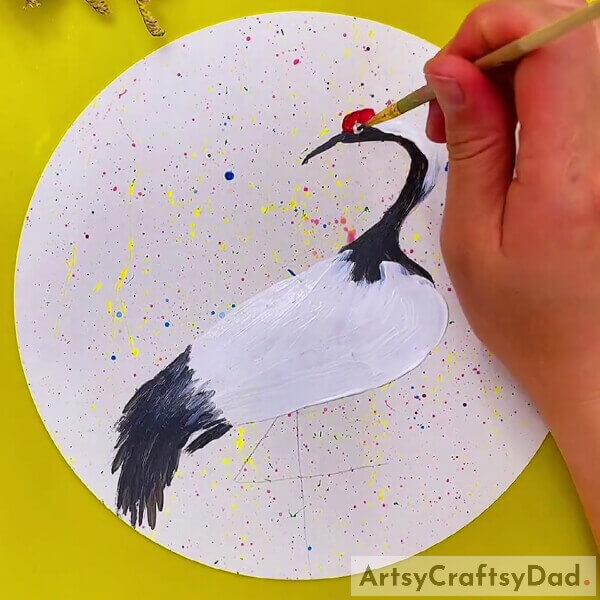 Make the eye in the center - Learn to Paint a Crane Bird with This Guide for Newbies 