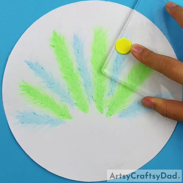 Making A Clay Circle On The Top Of Feather - Tutorial for a Fabulous Peacock Paper Creation