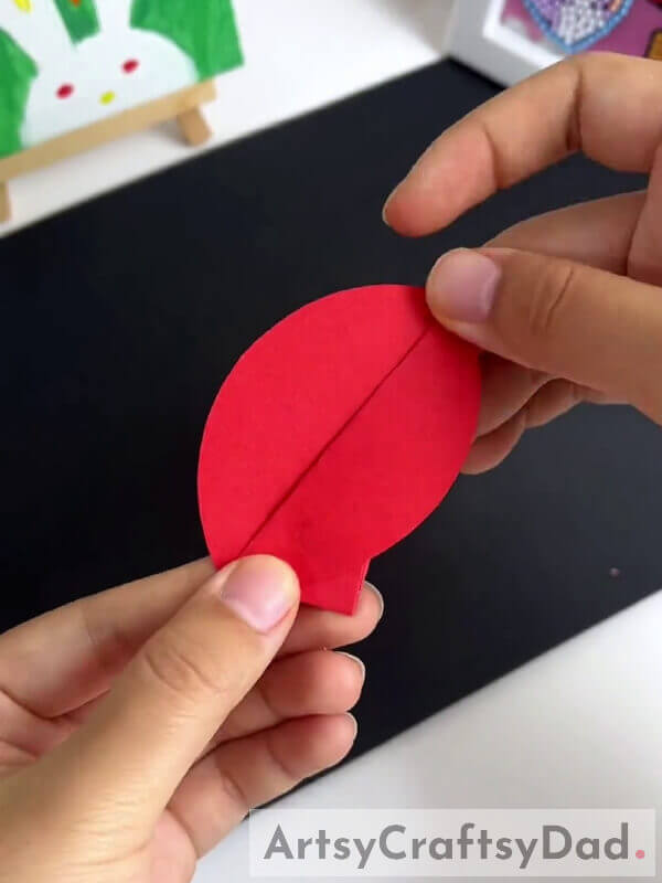 Making A Petal - Teach your kids to make a paper pinwheel flower with this guide 