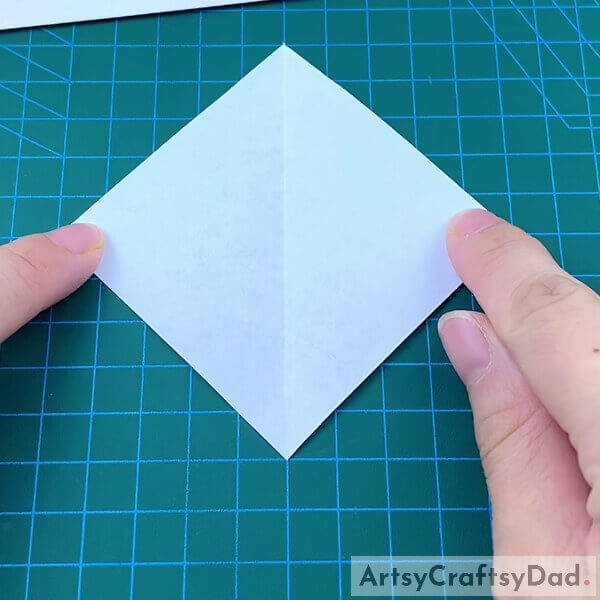 Making A Vertical Crease On Paper - Learn How To Make A Paper Origami Flip Flop Craft For Children 