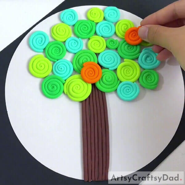Making Different Colored Leaves Of The Tree- A walk-through of how to make a clay tree in the shape of Kandinsky's circles 