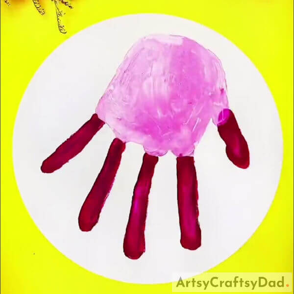 Making Hand Impression Of Palm On White Sheet Paper - A Step-by-Step Guide to Painting a Jellyfish Using Handprints