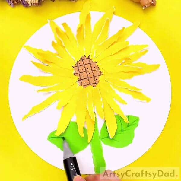 Making Leaves To the Stem- A Beginners Guide to Creating a Sunflower Art Piece Through Paper Tearing