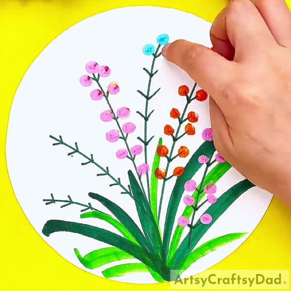 Making More Colored Flowers - Directions to paint colorful petals with your fingertips