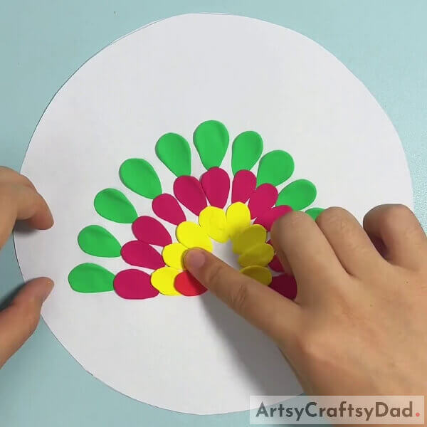 Making Pink, Yellow, And Red Feathers- How to Create a Vibrant Peacock with Clay
