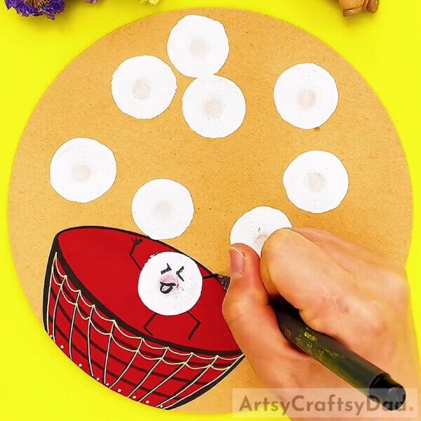 Making The Human Features Over The Circles - Moving in a comical manner while doing a painting