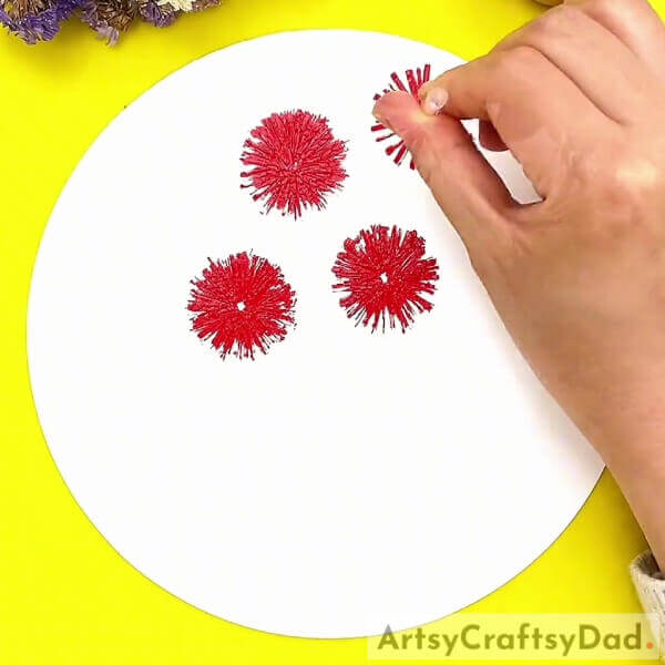 Painting The Other Flowers- A tutorial for kids to teach them how to create a stamp painting of red vector flowers.