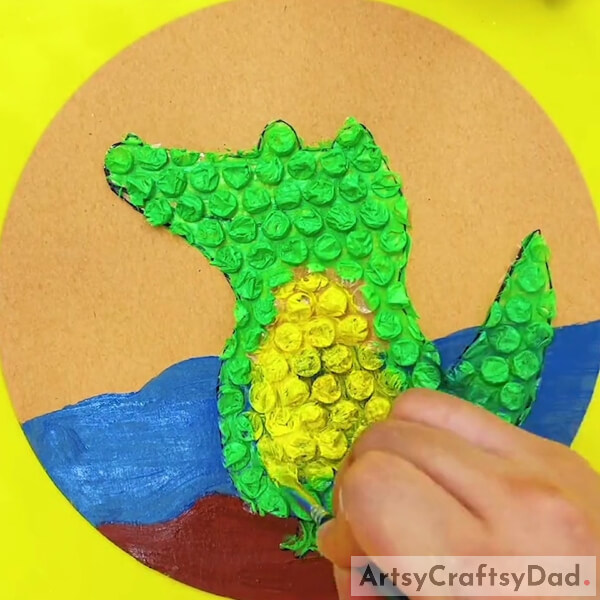 Painting the Crocodile's Belly- Tutorial for Assembling a Crocodile Artwork with Bubble Wrap