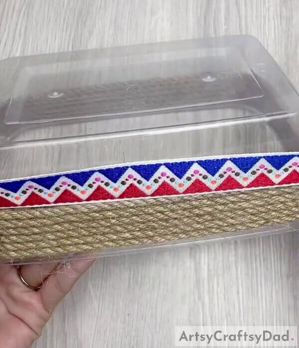Paste the Designed Cloth Strip - A tutorial for a jute thread adorned tissue box craft