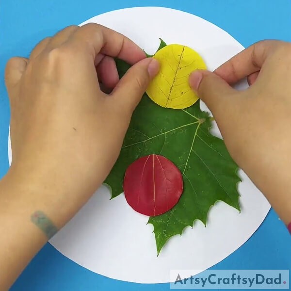 Pasting Both Leaves On Green Leaf- Crafting Leaves with Ladybugs Step-by-Step