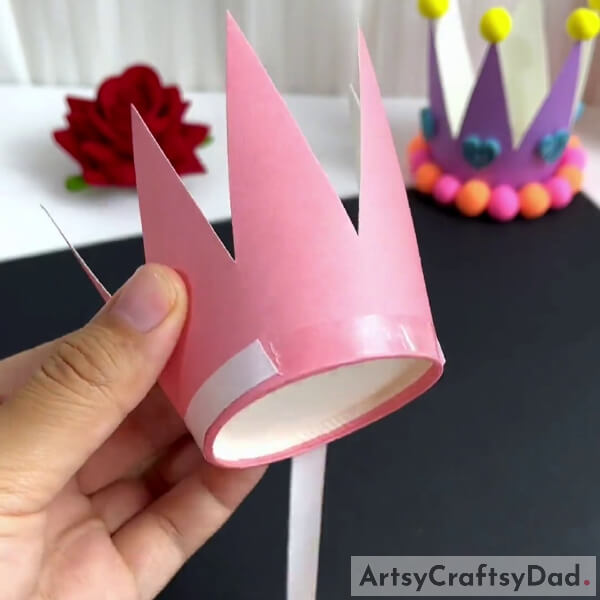 Pasting Double Sided Tape Around Crown- Step-by-Step Tutorial for Making Paper Cup and Clay Crowns 
