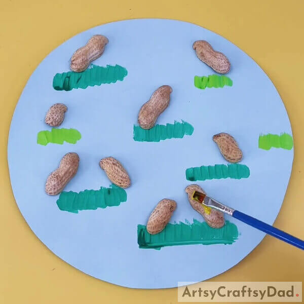 Pasting Our Peanut Shell Above All Grass- How to Make Peanut Shell Chicks for Youngsters