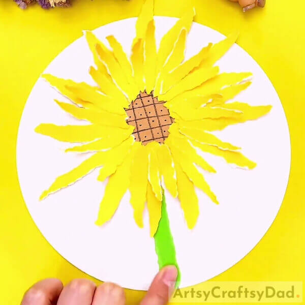 Pasting The Stem Of The Sunflower- A Guide to Paper Sunflower Tearing for Novices