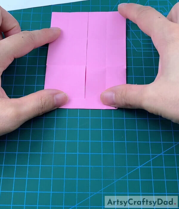 Secure the Fold - A guide on how to craft a paper bed and pillow with origami for kids