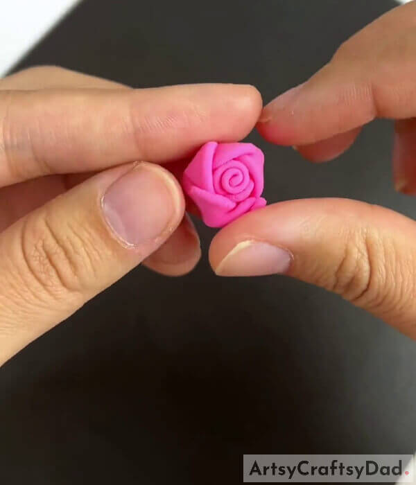 Securing The Fold Of The Rose- Tutorial for a Small Rose Bouquet Using Clay and a Surgical Mask
