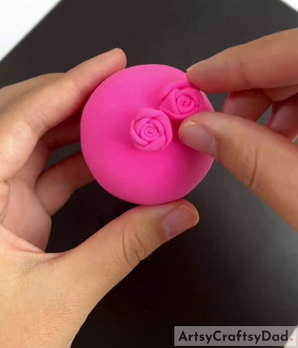 Sticking The Roses On The Clay Ball- How to Put Together a Mini Rose Bouquet with Clay and a Surgical Mask