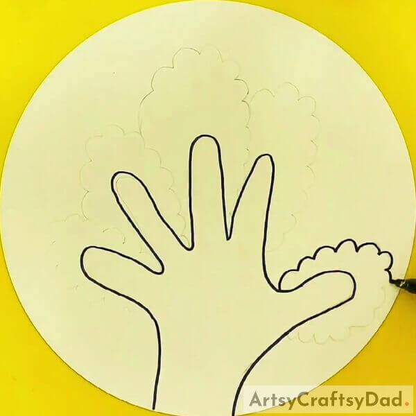 Trace the pencil outline and make some bushes around the fingers - How to Draw a Tree with Hand Outlines - A Tutorial for Kids 