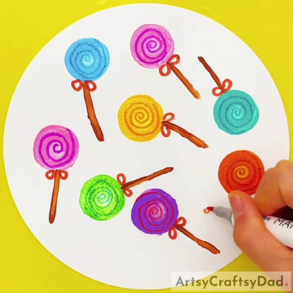 Completing Making The Spirals- Guide to creating a colorful lollipop stamp painting and drawing 