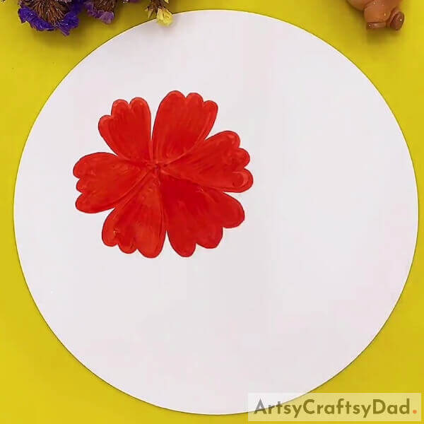 Completing Petal Coloring- A guide for kids to learn to sketch a red poppy flower