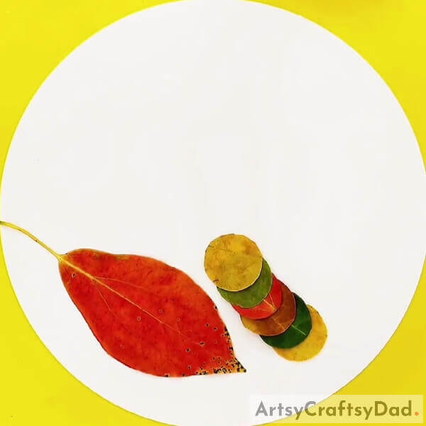 Cuting Some More Leaves- Crafting a caterpillar with leaves - a tutorial