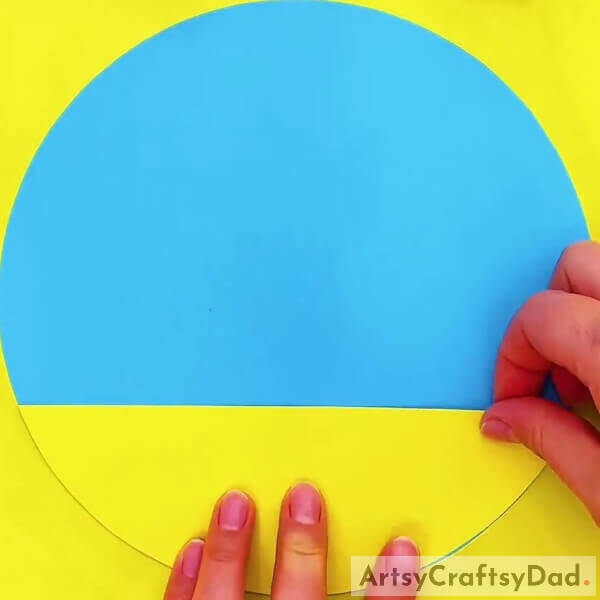 Cutting Blue And Yellow Color Craft Papers- Crafting a White Cherry Blossom Vase